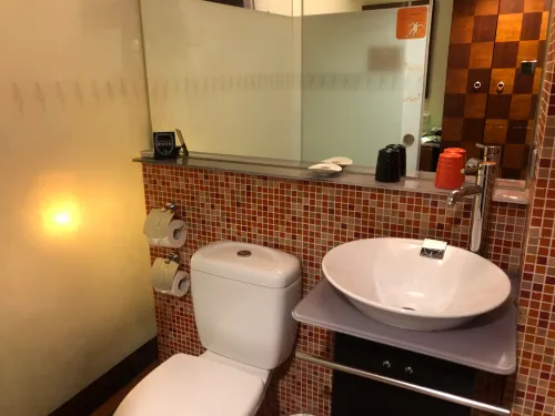 In One City Inn Chambres Photos