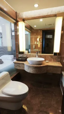 Kunming Green Land Hotel Chambres Photos
