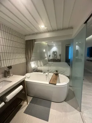SYN Boutique Hotel Rooms Photos