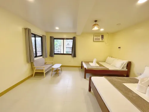 Cozy Coron Inn Chambres Photos