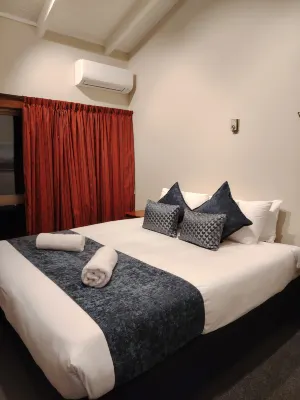 Magnolia Park Kamar Photos
