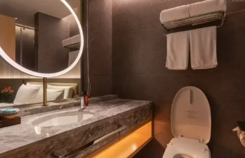 Orange Hotel Kamar Photos
