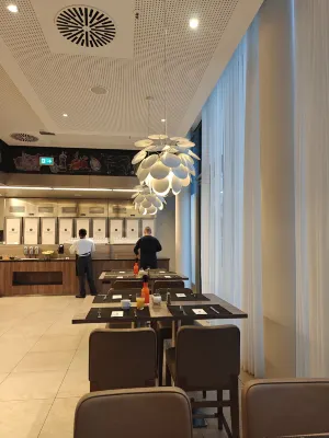 H4 Hotel München Messe Mahlzeiten Photos