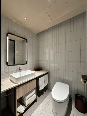 Orange Hotel Kamar Photos