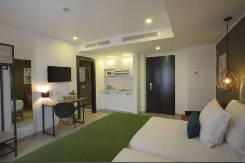 Maia Hotel Suites Rooms Photos