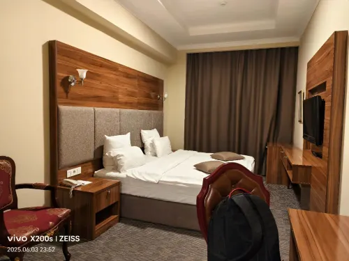 Grand Hotel Eurasia Kamar Photos