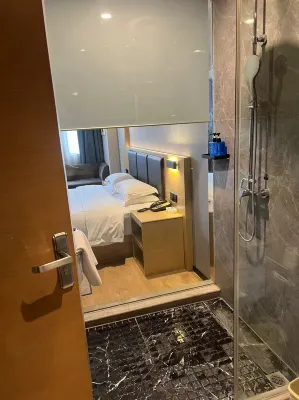 Nanning Jinshuiwan International Hotel ( Nanhu Park Macun Subway Station) Номера Photos