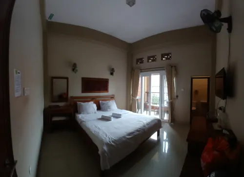 Urbanview Hotel Syariah Insani Cisarua Puncak Kamar Photos