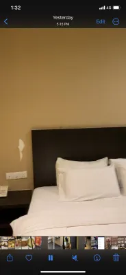 Capital O 91074 Grand World Hotel Zimmer Photos