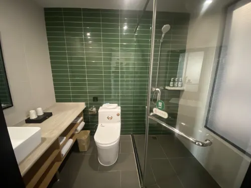 GreenTree Inn Zhixun (Dalian Zhoushuizi Airport Xinzhaizi Metro Station) الغرف Photos