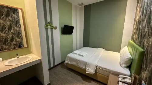 Kama Hotel Kamar Photos