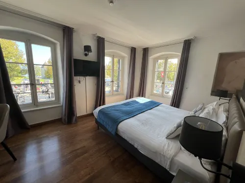L'Hotel by Hostellerie du Chateau Zimmer Photos