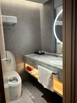 Orange Hotel Kamar Photos