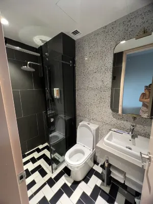 Sleeping Lion Suites Kamar Photos
