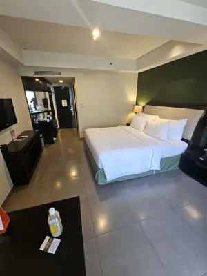 Swiss-Belhotel Rainforest Kamar Photos