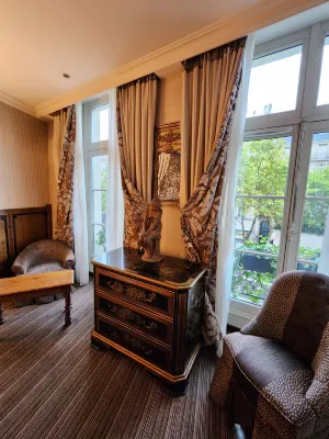 Au Manoir Saint-Germain des Prés. Chambres Photos