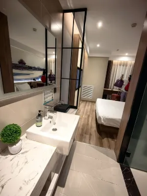 Linyi Collection Hotel (Universal Beijing Wanshengdong Subway Station Branch Beijing) Kamar Photos