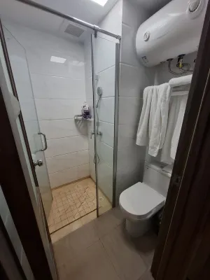 Jizhu Holiday Apartment (Hainan University City People's Hospital) Zimmer Photos