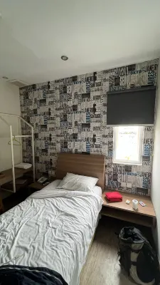 Kama Hotel Kamar Photos