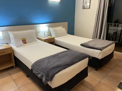Coral Tree Inn Camere Photos