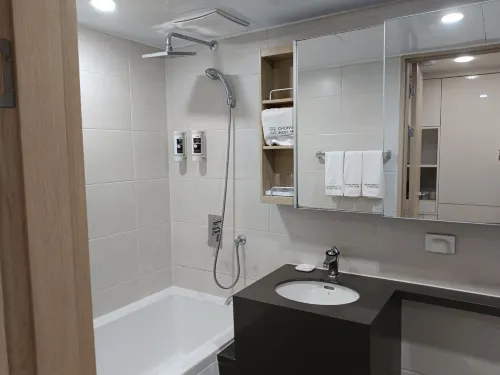 Chungchoho Best Hotel Номера Photos