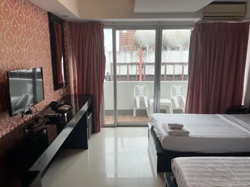 7Q Patong Beach Hotel Chambres Photos