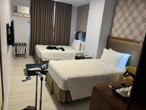 One Central Hotel & Suites Rooms Photos