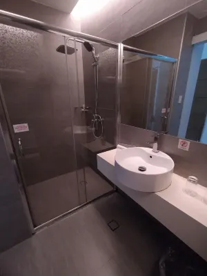 One Central Hotel & Suites Rooms Photos