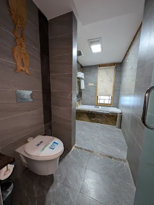 Lijiang Fengyasong Wenjinyuan Chinese Inn · Naxi Guyuan Camere Photos