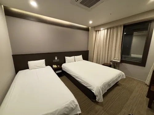 Palace Hotel Jeju Zimmer Photos