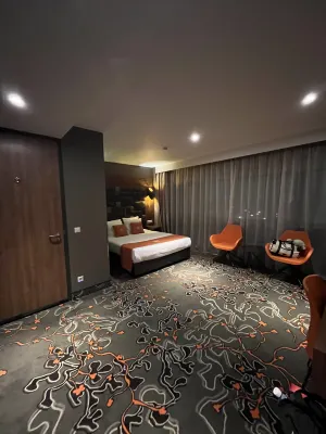 XO Hotels Park West Zimmer Photos