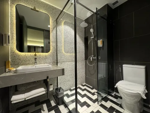 Sleeping Lion Suites Kamar Photos