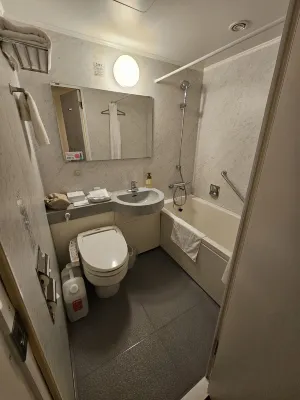 Hotel Sunroute Tokushima Zimmer Photos