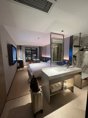 Langyi Hotel (Guangzhou Tower Pazhou Exhibition Center Branch) الغرف Photos