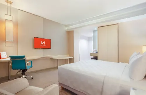 Swiss-Belhotel Jambi Chambres Photos