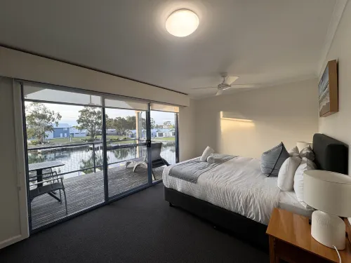 Captains Cove Resort - Waterfront Apartments Camere Photos
