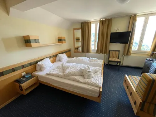 Hotel Victoria Lauberhorn Wengen, a Faern Collection Hotel Zimmer Photos