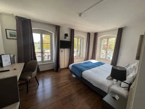 L'Hotel by Hostellerie du Chateau Zimmer Photos