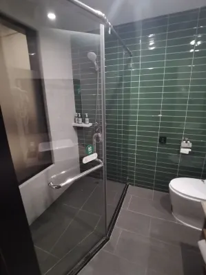 GreenTree Inn Zhixun (Dalian Zhoushuizi Airport Xinzhaizi Metro Station) الغرف Photos