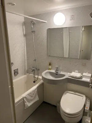 Hotel Sunroute Tokushima Zimmer Photos