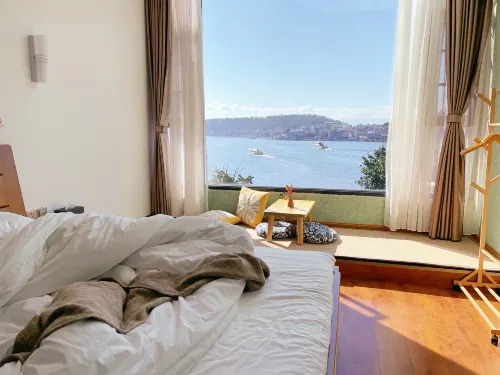 Qingwu Hotel Rooms Photos