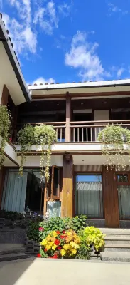 Yihe QIshe Inn (Lijiang Dashuiche Shop) Экстерьер Photos