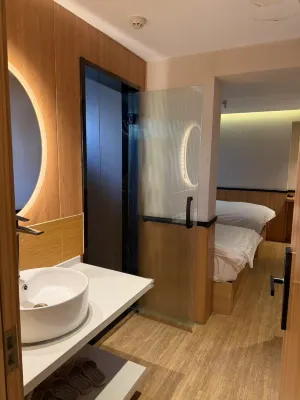Qianji Hotel Rooms Photos