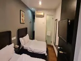 Kawana Tourist Inn Zimmer Photos