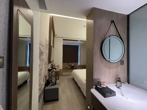 Travel World Hotel Chambres Photos