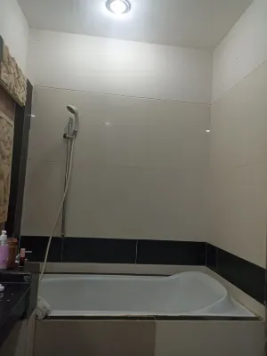 Nirmala Hotel & Convention Centre Kamar Photos