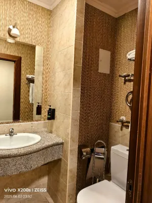 Grand Hotel Eurasia Kamar Photos