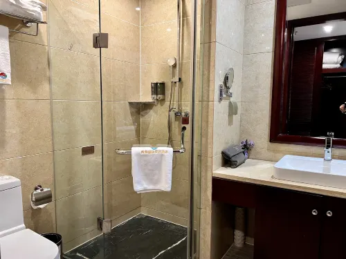 Xin Hai International Holiday Hotel Chambres Photos