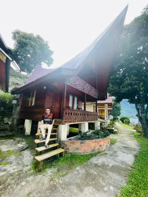 Tuk Tuk Timbul Bungalows Photos