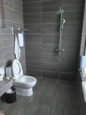 Qingwu Hotel Rooms Photos